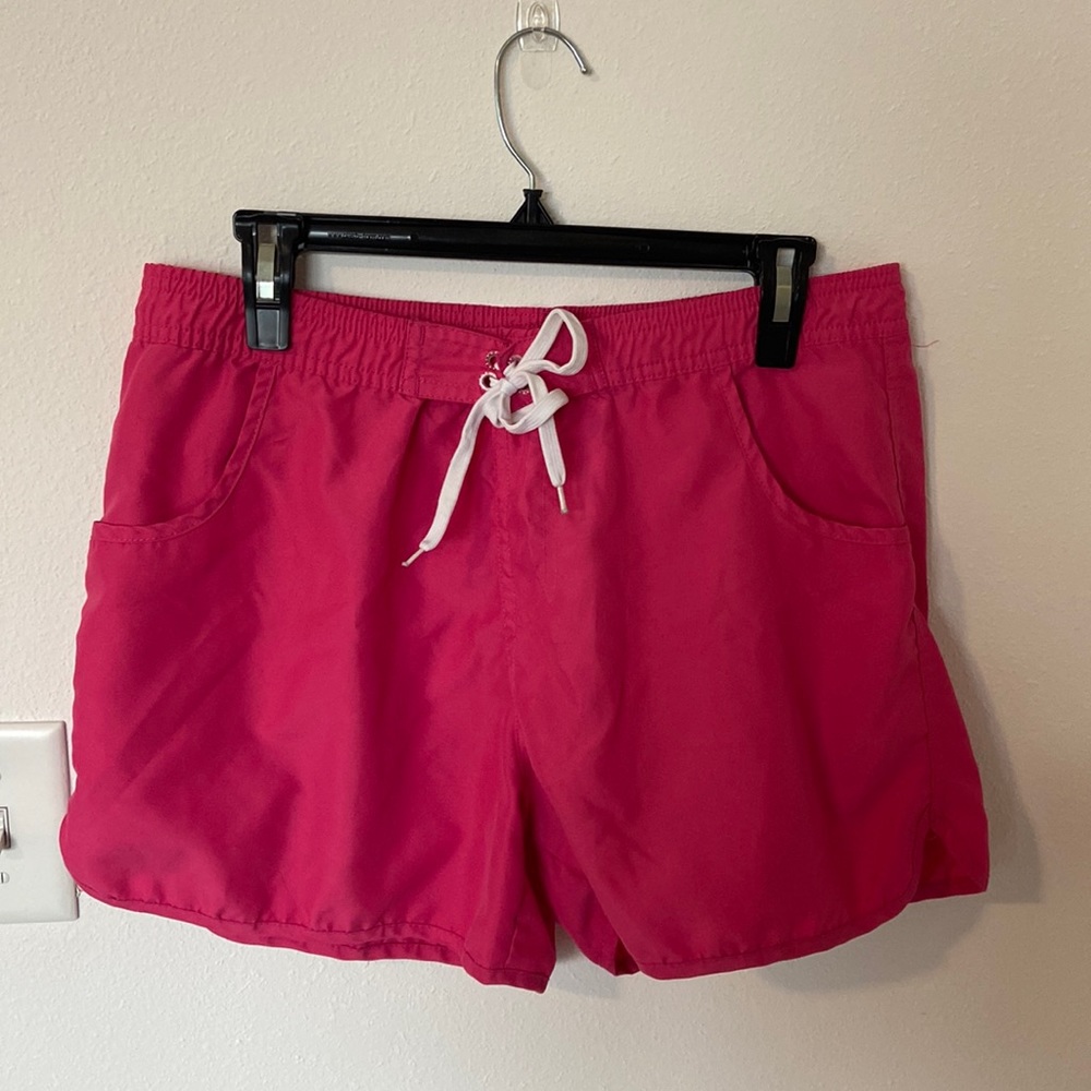Men’s hot pink swim trunks